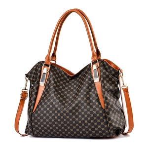 Elegante borsa a mano da donna con motivo geometrico a farfalla e manici in pelle marrone
