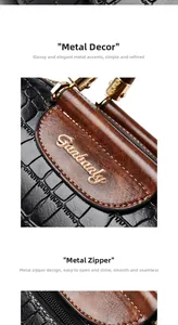Detail of stone pattern texture, golden hardware and smooth zipper on women handbag