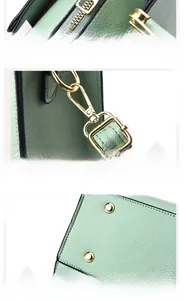 Detailansicht der mintgrünen Tasche mit goldener Hardware und Metallnieten aus Leder