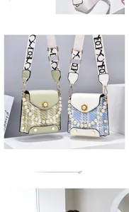 Detail of tweed crossbody bags with pearl handles and jacquard straps in two colors