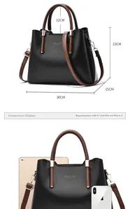 Black tote bag size comparison showing dimensions and fitting an iPad with iPhone X