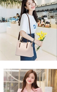 Close-up of beige leather handbag with brown handles and gold logo in cafe setting