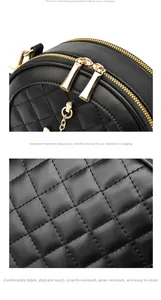 Detail of quilted leather bag showing smooth metal zippers and polished hardware hooks