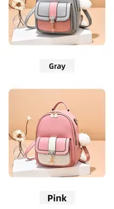 Détail de sacs à dos en similicuir gris et rose avec motifs matelassés et glands