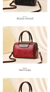 Detailed comparison of black small and red large stone pattern boston bags with logo