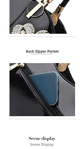 Detail view of glossy patent leather bag featuring floral embroidery and back zipper pocket