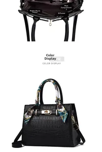 Détails du sac à main noir en cuir crocodile avec foulard et compartiments intérieurs