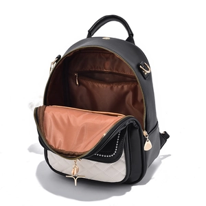 Mini sac à dos en similicuir noir et blanc avec motif matelassé et éclair étoile dorée