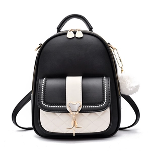 Mini sac à dos mode bicolore noir et blanc avec poche matelassée et breloque de souris