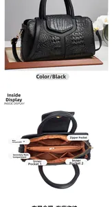 Detailed interior view of a black crocodile pattern tote bag with large compartments