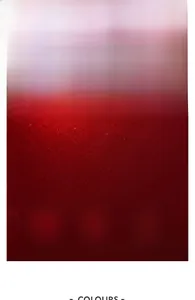 Detail of red cowhide leather texture with glossy finish and soft pebble grain