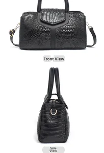 Front and side view of black crocodile pattern handbag with gold metal hardware