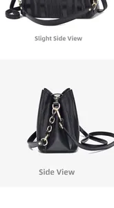 Detailed side view of black bucket bag featuring textured V-quilt pattern and gold chain