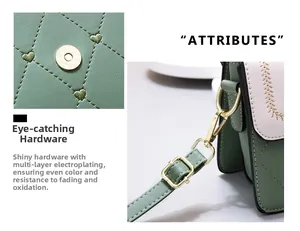 Close-up of light gold plated magnetic clasp and heart stitching on green shoulder bag