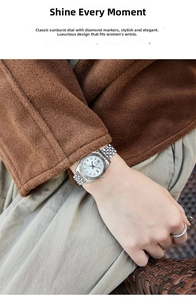 Primo piano dell'orologio al quarzo GEDI da donna con quadrante soleil e indici di diamanti