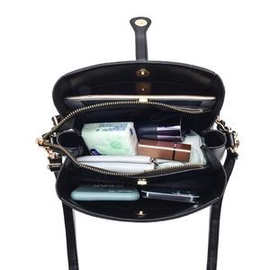 Large black pebbled leather bucket bag with multi-compartment interior for tablets