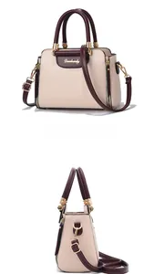 Detail view showing front and side profile of two-tone contrast crossbody handbag