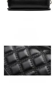 Detail view of black quilted PU leather bag showing bottom structure and stitching texture