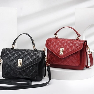 Chic quilted leather handbags in black and burgundy with elegant golden metal locks