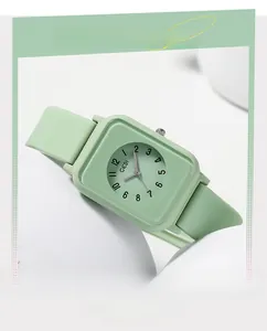 Close-up of mint green silicone square quartz watch with Arabic numeral markers