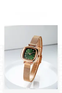 Close-up of GEDI ladies' watch with retro green dial and rose gold mesh strap