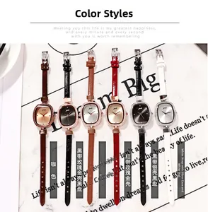 Flat lay of vintage women quartz watches with rectangular diamond-set dials and leather straps