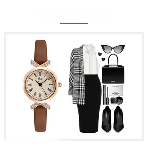 Detail of Gedi quartz watch with Roman numerals, rose gold case, and brown leather strap