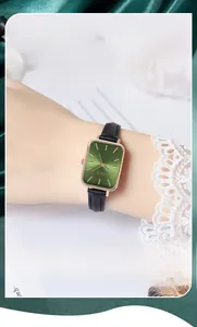 Elegant rectangle quartz watch with emerald green sunburst dial and black leather strap