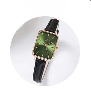 Detail view of GEDI vintage square gold watch with green sunray dial and black leather strap