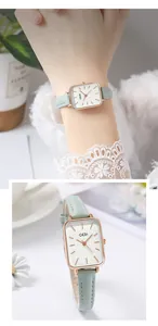 Close-up of square rose gold watch with mint green leather strap and lace detail