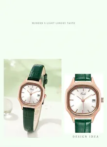 Close-up of rose gold hexagonal watch case with green leather strap and date display