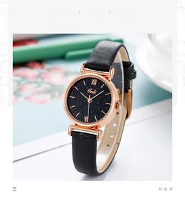 Close-up of Gedi starry quartz watch with black leather strap and rose gold metal case