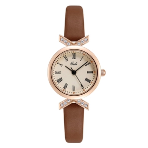 Gedi luxury rose gold watch with bow-shaped diamond lugs and brown leather strap
