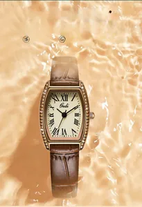 Detail of tonneau quartz watch showing 30m waterproof performance in water ripple setting