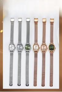 Detail of elegant oval-dial women's watches featuring assorted colors and mesh steel bands
