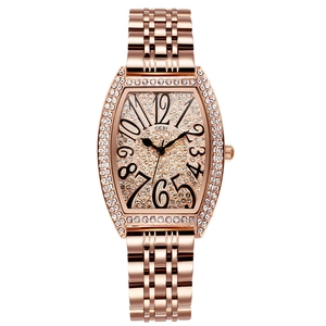 Orologio tonneau lussuoso in oro rosa con cristalli e numeri neri per donna elegante
