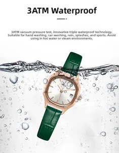 Close-up of waterproof gold women's watch splashing in water showing 3ATM durability
