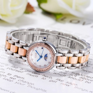 Montre femme élégante en acier inoxydable avec phase de lune, date et cristaux