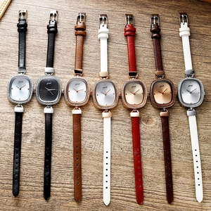 Elegant round ladies' leather strap watches with crystal-set bezels in multiple colors
