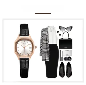 Fashionable rose gold tonneau watch with date display and black leather strap layout