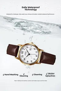Waterproof vintage watch with gold case and brown leather strap submerged in water