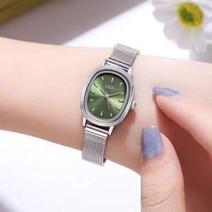 Elegant GEDI women's watch featuring a silver oval case and green sunray dial