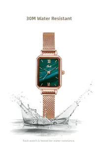 Waterproof rose gold square watch with green malachite dial and mesh band splashes