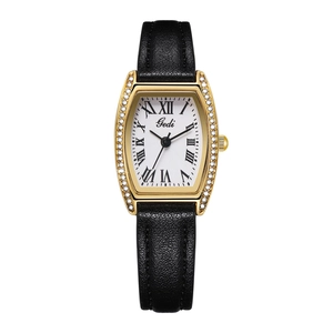 Macro detail of Gedi tonneau watch with crystal bezel and roman numeral dial