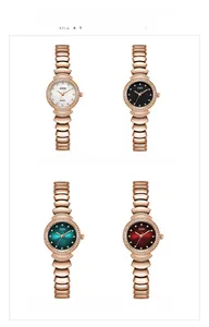 Détail de quatre montres à quartz GEDI vintage avec lunettes en cristal et cadrans soleil