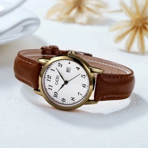 Orologio GEDI minimalista da donna con cassa dorata, quadrante bianco e cinturino pelle