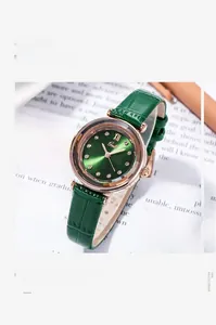 Detail of Gedi quartz watch featuring emerald green dial and crocodile leather strap
