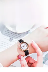 Elegant ladies watch with rose gold case, white rhinestone dial and black leather strap