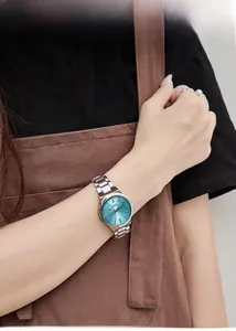 Close-up of GEDI women's watch with blue sunray dial and silver steel bracelet