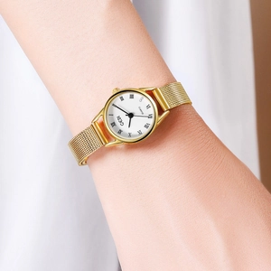 Detail of GEDI vintage gold quartz watch with Milanese mesh strap and Roman numerals